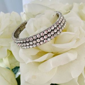 Rhinestone and silver tone adjustable triple bracelet perfect for the holidays